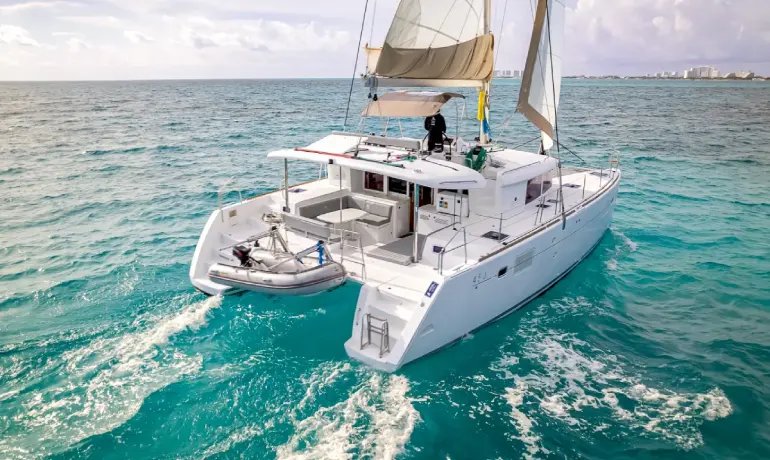bow view of parsifal catamaran sailing over caribbean sea