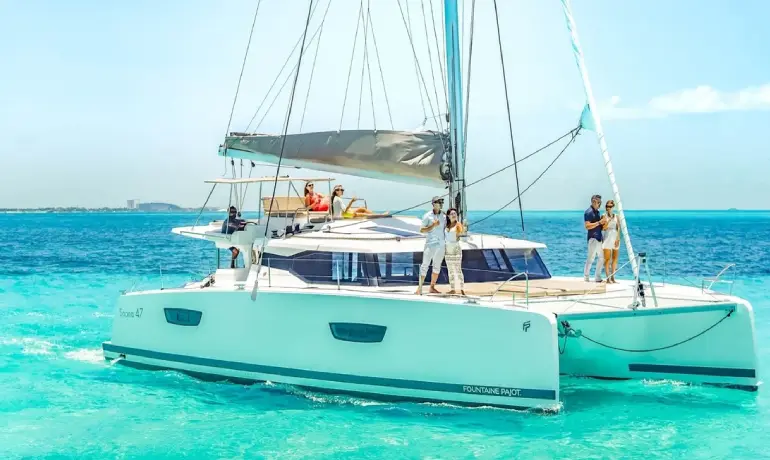 People looking at the sea from the sten of victoria catamaran